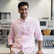 Dhyey Shah - exchange student
Male student standing in an engineering lab